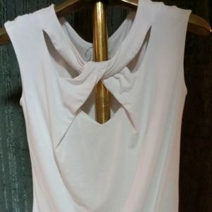 White top. Criss cross front